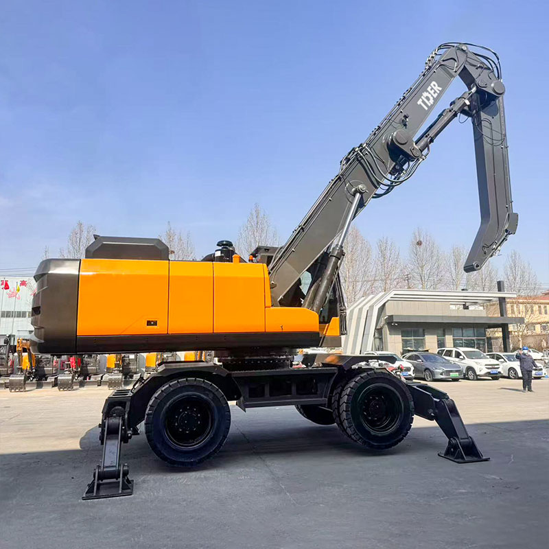 Máy xúc bánh lốp 40 tấn với gầu xúc xoay kiểu vỏ cam.