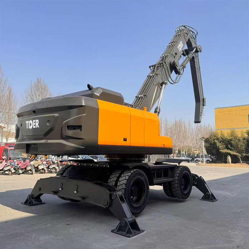 Máy xúc bánh lốp 40 tấn với gầu xúc xoay kiểu vỏ cam.